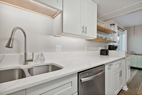 Updated Bright White Kitchen with Open Shelving