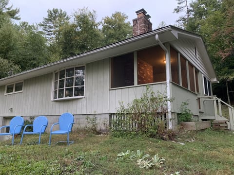 Cottage with screen porch. Main entrance at side through screen porch.