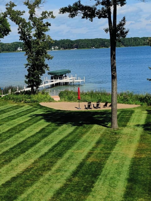 Sand beach area with boardwalk to water