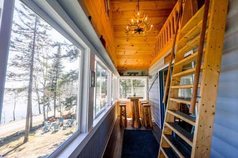 Ascend to new heights of tranquility on our upper deck, where a wooden ladder beckons you to escape and explore.