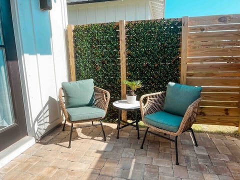 Relax on your private patio off the downstairs master bedroom