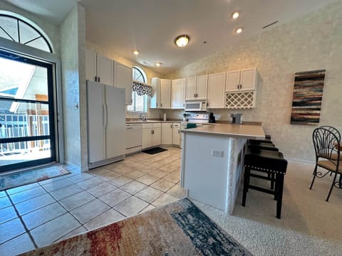 Bright and open kitchen is great for preparing a meal for family and friends.