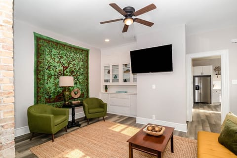 Spacious Living Area with large smart TV