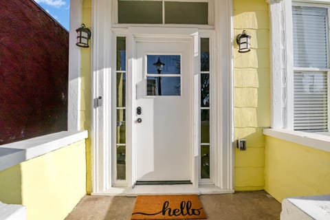 Main front door leading to shared foyer where main entrance to Wildwoodlands unit is.