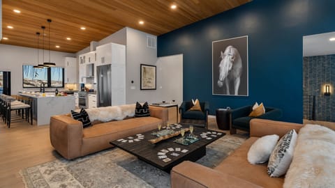 Great room with dramatic accent wall and beautiful design