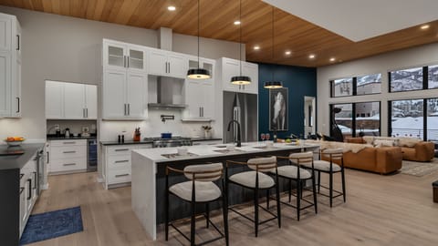 Large gourmet kitchen with breakfast bar seating