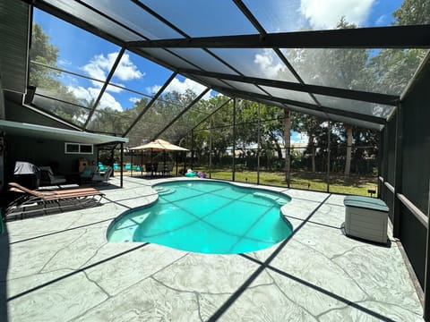 Pool, with outdoor grill.