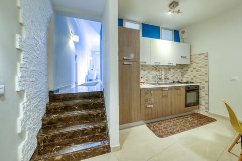 kitchen La Cattedrale Apartments&Suite 1 - Affitti Brevi Italia