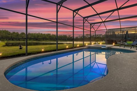 Enjoy the pool with its stunning view of the lake. 
