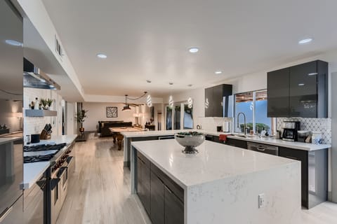 Newly renovated (2023) kitchen with coffee bar, gourmet Wolf range & wine cooler
