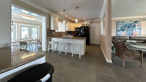 Kitchen area: kitchen island with 3 bar stools,Refrigerator,stove,oven&many more