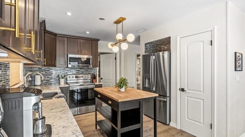 Whip up culinary masterpieces in this stunning and functional kitchen space.