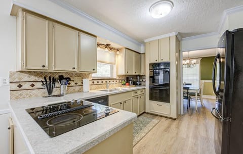 Bright and open kitchen with lots of counter space to prepare food.