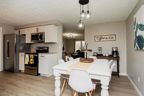 Gather around the dining table for six, perfect for family meals or casual dinners with friends.