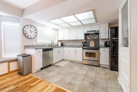 Fully stocked kitchen.Keurig coffee bar with complimentary coffee.Large Fridge.