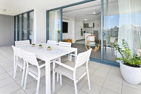 Apartment flows out to a huge deck with outdoor dining