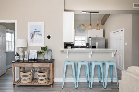 Walking into the home you are greeted with a coastal theme putting you into vacation mode as you enter the home