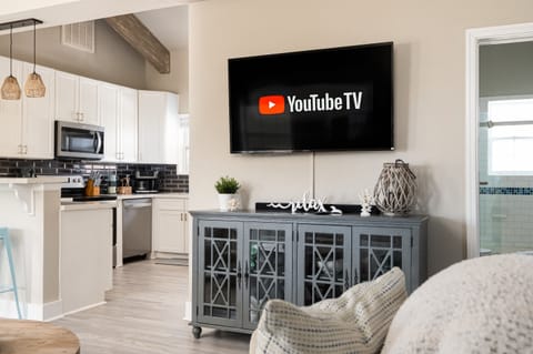 Relax in the living room watching your favorite shows. All rooms equipped with SmartTV's and YouTubeTV included