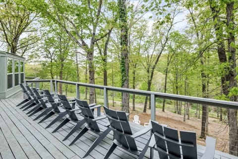 Relax on our wraparound deck with Adirondack chairs and enjoy serene woodland and lake vistas after a day on the trails.