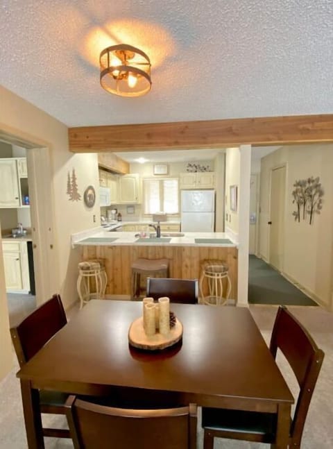 Dining area looking into kitchen
