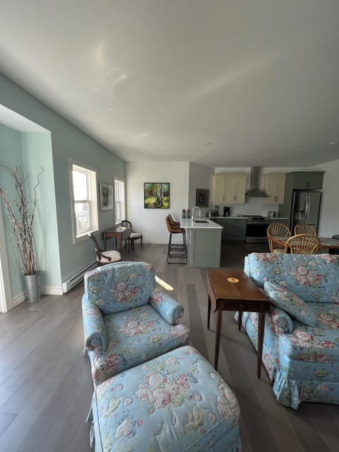 Spry 3 upper level end unit with an open floor plan, kitchen, living room and dining area all overlooking the water 100' away.