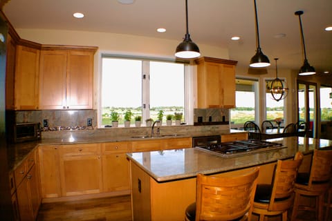 Wolf cooktop, double oven, Keurig, microwave, toaster oven, & air fryer.