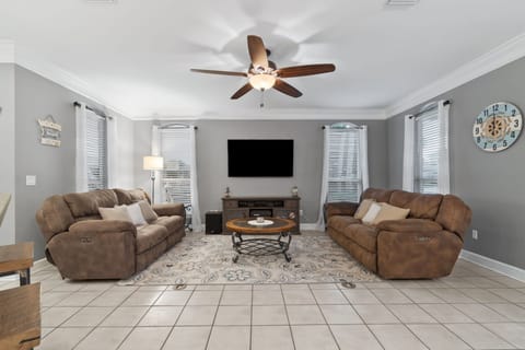 Living room area big enough for a group or family of ten