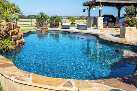 The pool is behind your host's home, not the guesthouse.