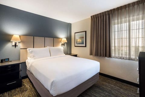 Drift into deep sleep on a plush, hotel-made bed.