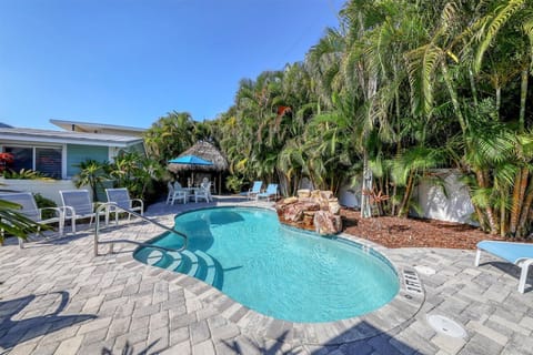 Heated pool with waterfall