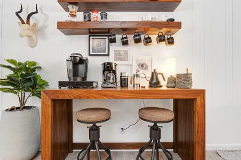 Fully stocked coffeebar complete with a Keurig, drip, French press, or pourover for your favorite cu