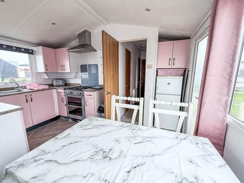 The dining area is perfect for starting your day with a hearty breakfast.