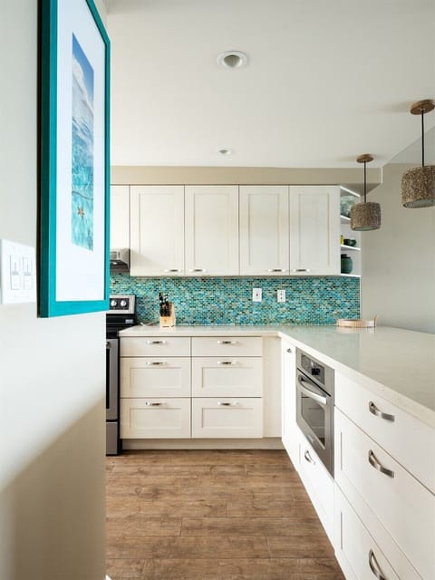 Fully stocked kitchen has everything you need for preparing preparing meals right at the condo.