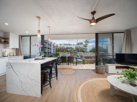 Bright and airy living room and kitchen w/ sliders open