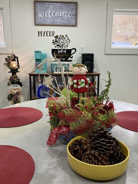 Coffee bar area with coffee, donuts & snacks