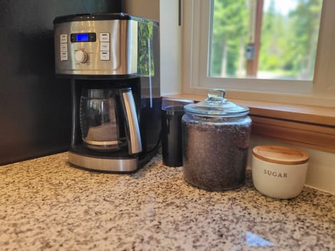 Coffee pot and provided beans.