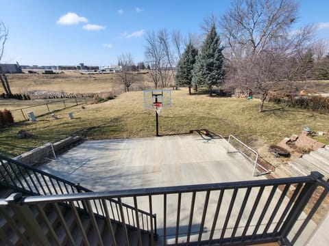 Backyard patio w/ basketball court
