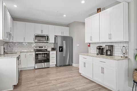 Large kitchen fully equipped with what you'll need during your stay!