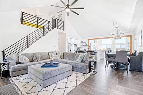 The open areas of the main level allow lake light to reach everywhere with the loft set apart for sleeping.