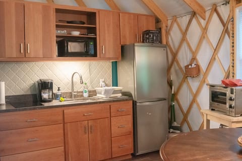 Our fully-stocked kitchen includes a cooktop, toaster oven, microwave & toaster.