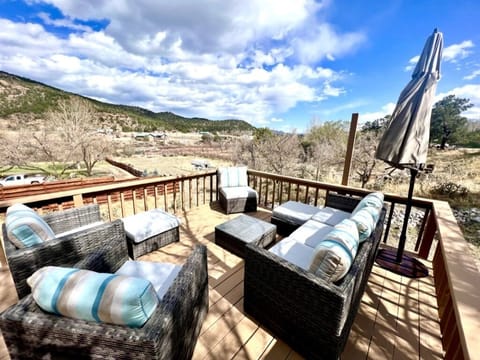 Deck off the back of the A-Frame, overlooks the property. Seating for six plus.