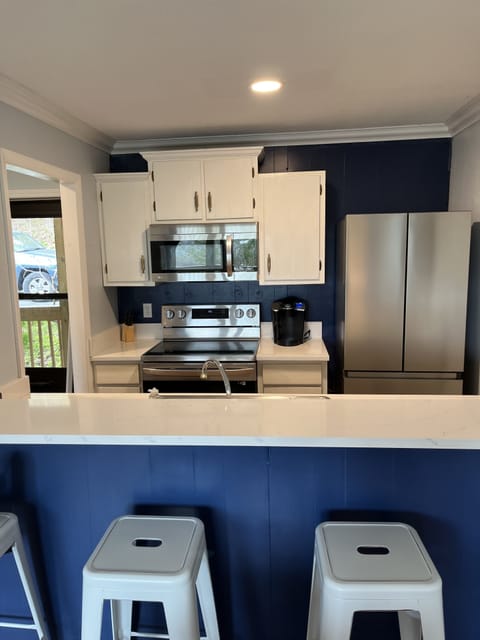 Enjoy the many updates to the fully-stocked kitchen.