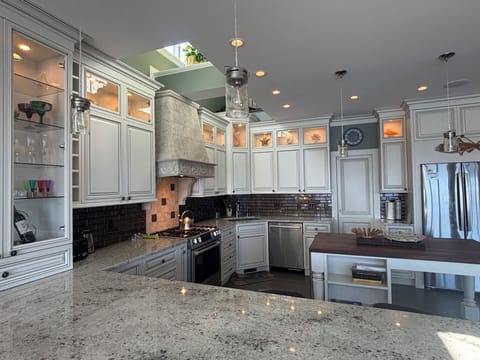 The spacious stone countertop seats 6.