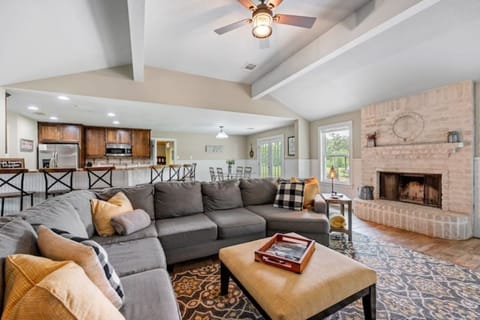 Living room with fireplace, smart TV, and lots of room.