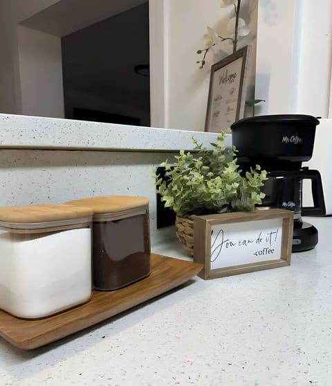 Our Coffee Station has coffee, sugar and a Coffee Maker ready for you to use them!