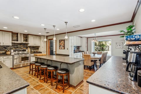 The custom gourmet kitchen really is the center of the home