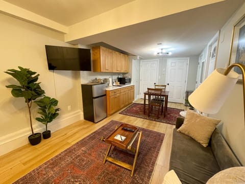 Dining space and Kitchen area. Wall mounted TV 