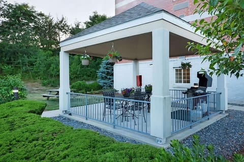 Grill and relax outdoors in the peaceful covered patio.