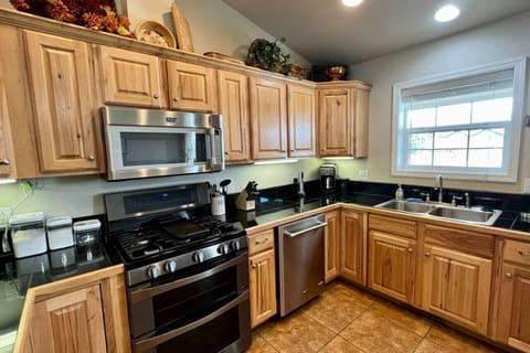 Beautiul upgraded cabinets, appliances, gas range, and stunning countertops!