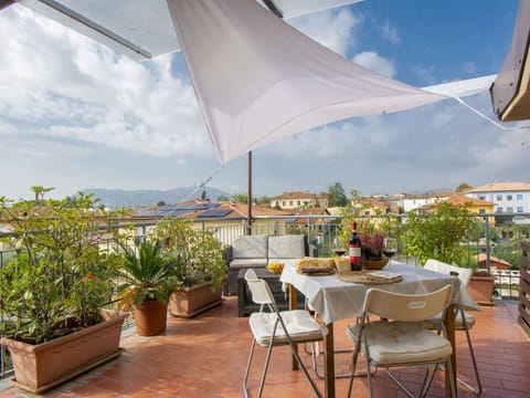 Sky, Plant, Table, Furniture, Property, Cloud, Chair, Building, Flowerpot, Shade